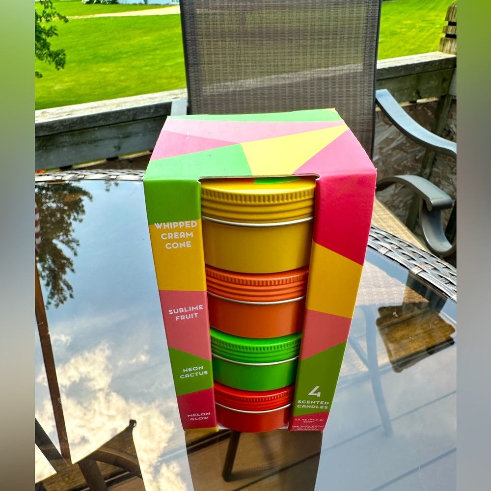 🌸🧡💛💚NWT 4 pack Tin Candle set